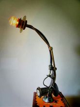 Steampunk desk or dresser lamp: Armcarbon filament lamphourglass and and cable dimmer.